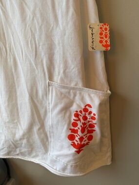 FP Movement by Free People sold out White hot shot mini dress  logo M or XL